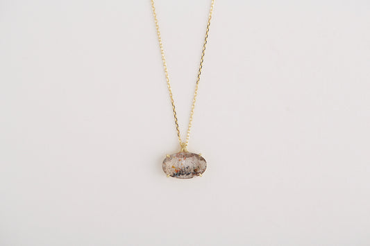 Goethite in quartz necklace