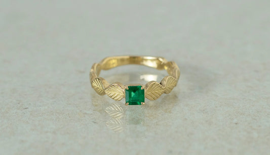 Leaf ring + emerald