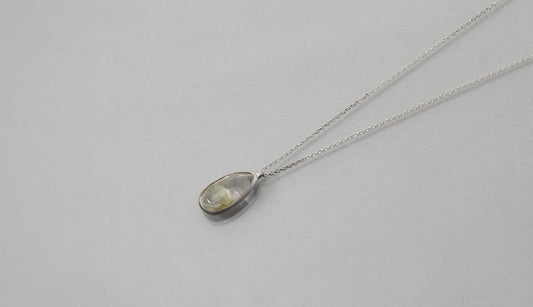 Green phantom in quartz necklace