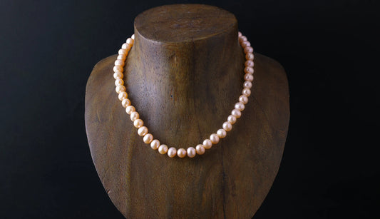Pale orange pearl necklace 約43cm
