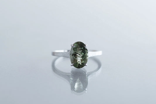 Ludwigite in peridot ring